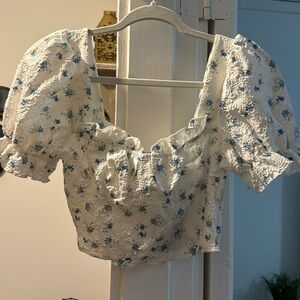 White floral top with puffy sleeves